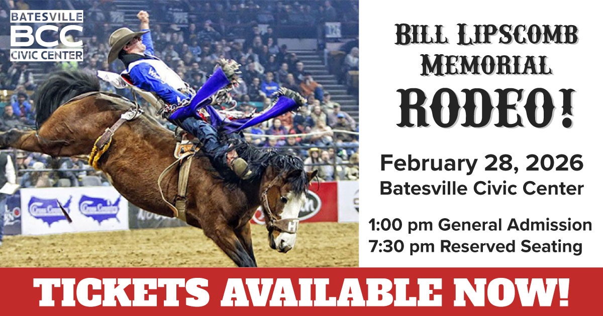 Cowboy riding bucking horse
